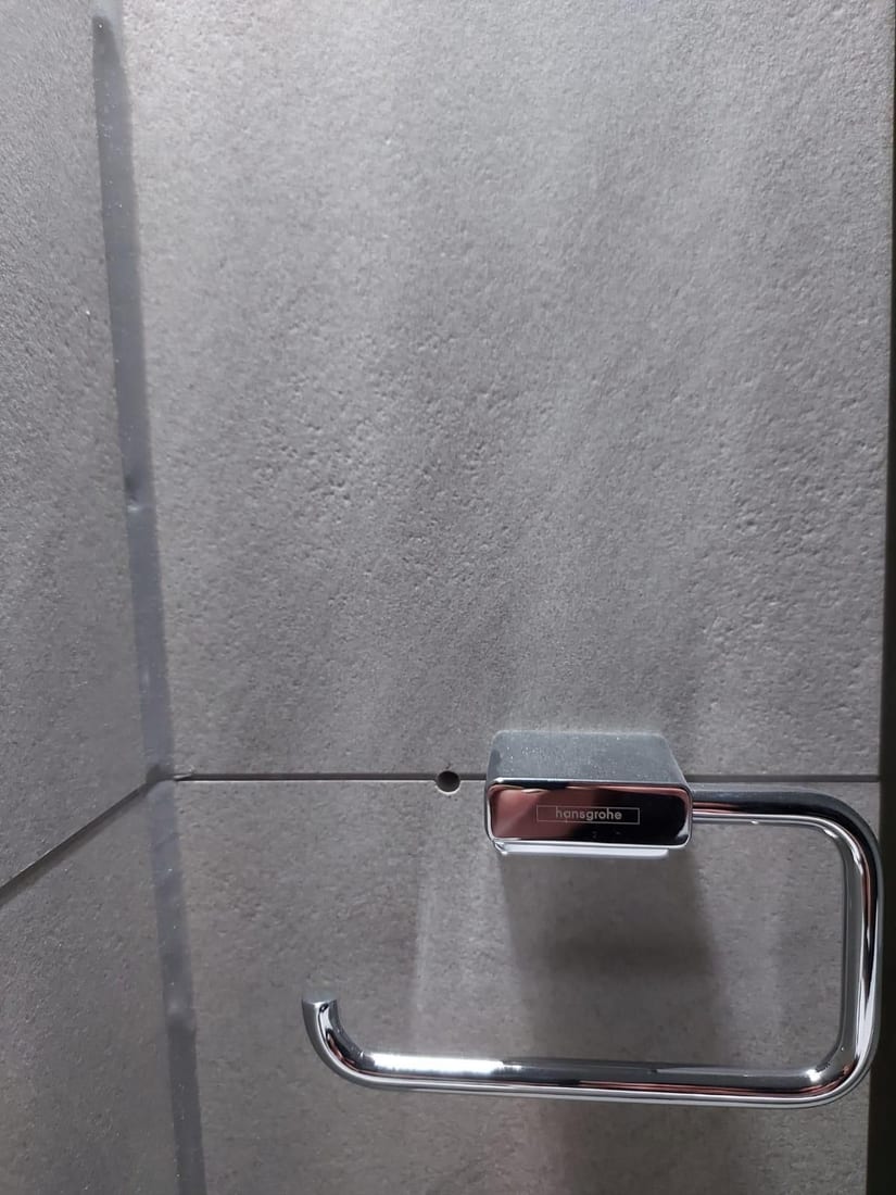 Wall fitting removed and the surface made good Before