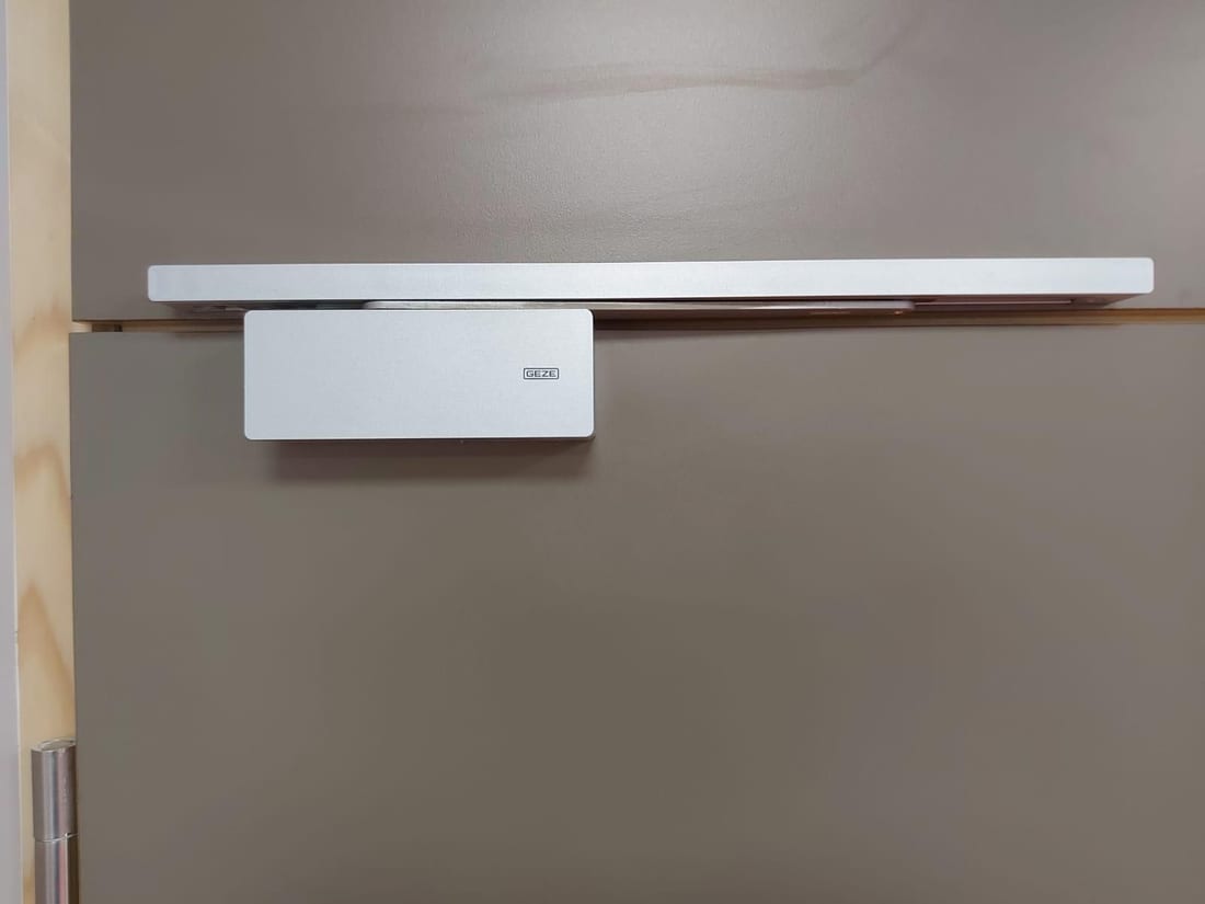 Wall above a door closer After