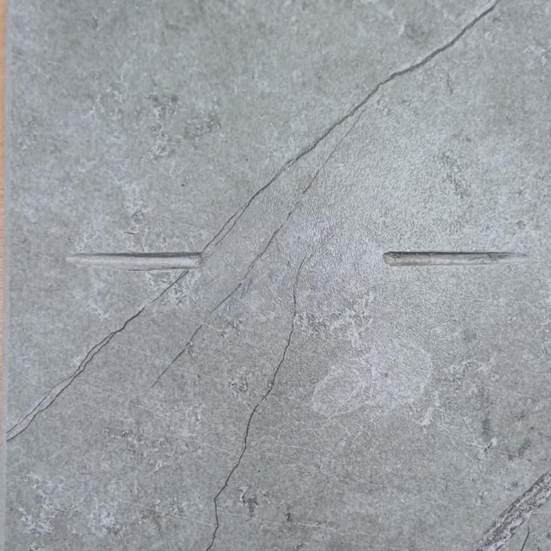 Demonstration: scratch removed on one half, the other left untouched After