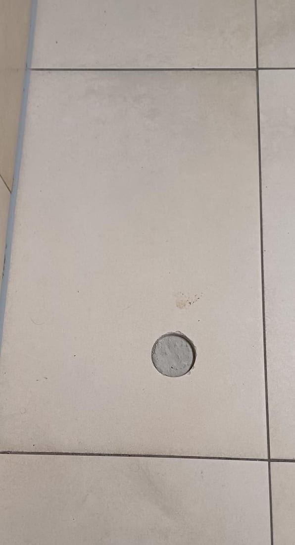 Damaged tile face made good Before